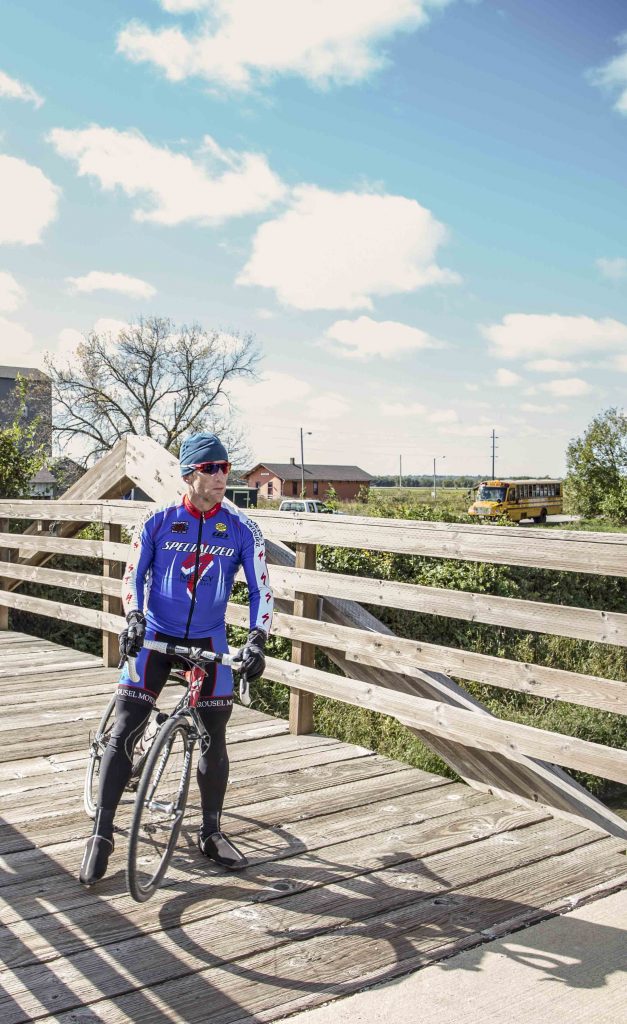 Man biking at Bike & Hike Weekend in Amana, Iowa